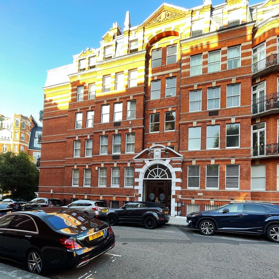 Kensington Court Mansions, W8, red brick mansion block with restored timber sash windows